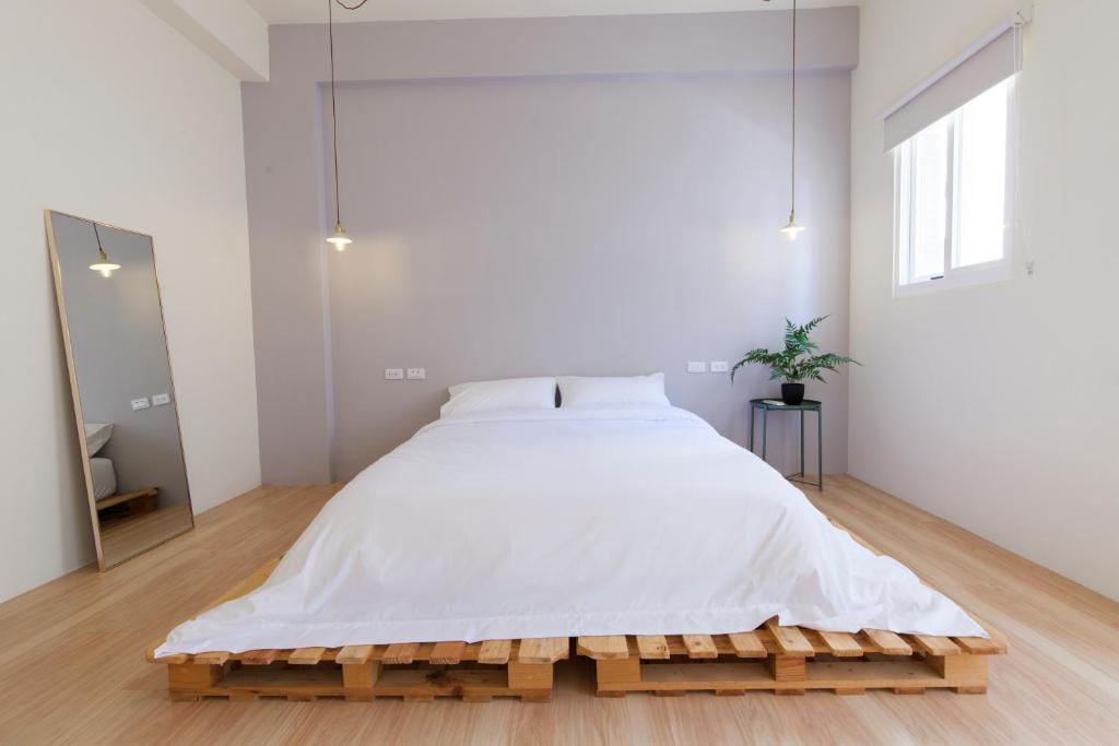 Postel nebo postele na pokoji v ubytování 01+ Home