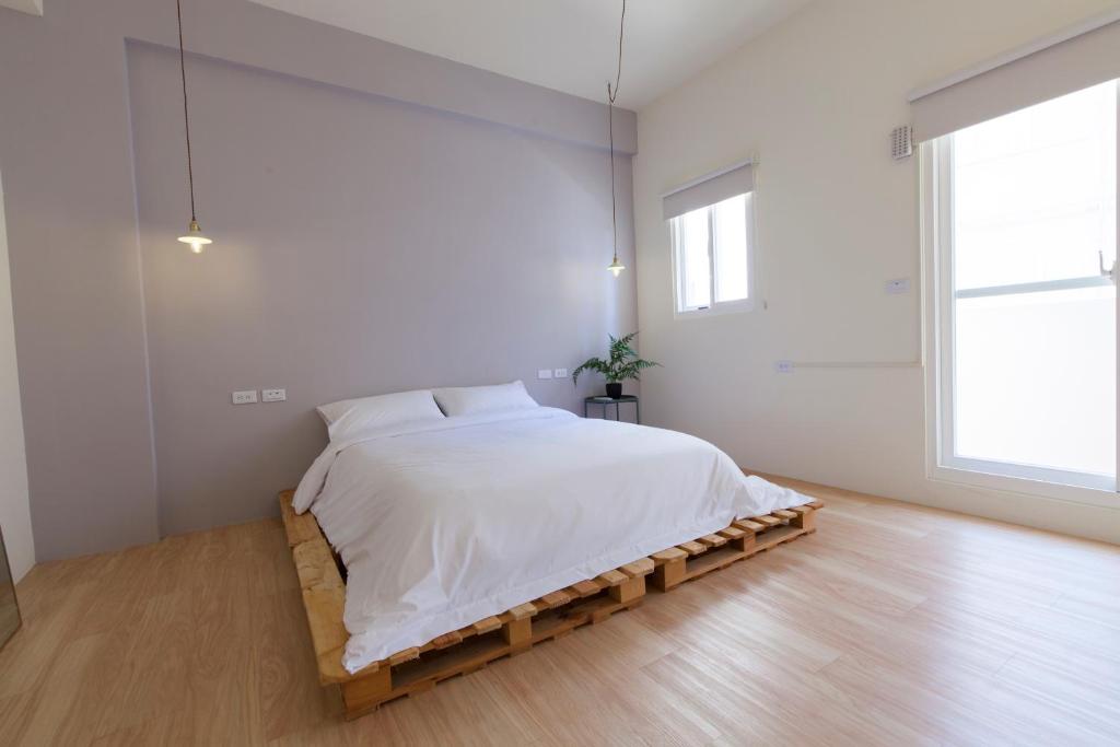 Postel nebo postele na pokoji v ubytování 01+ Home