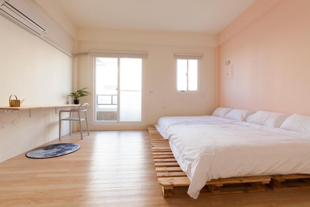 Postel nebo postele na pokoji v ubytování 01+ Home