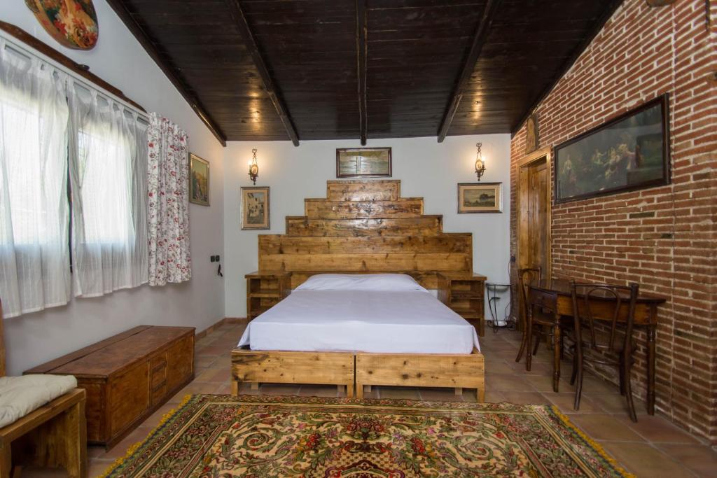 A bed or beds in a room at Agriturismo Papyrus