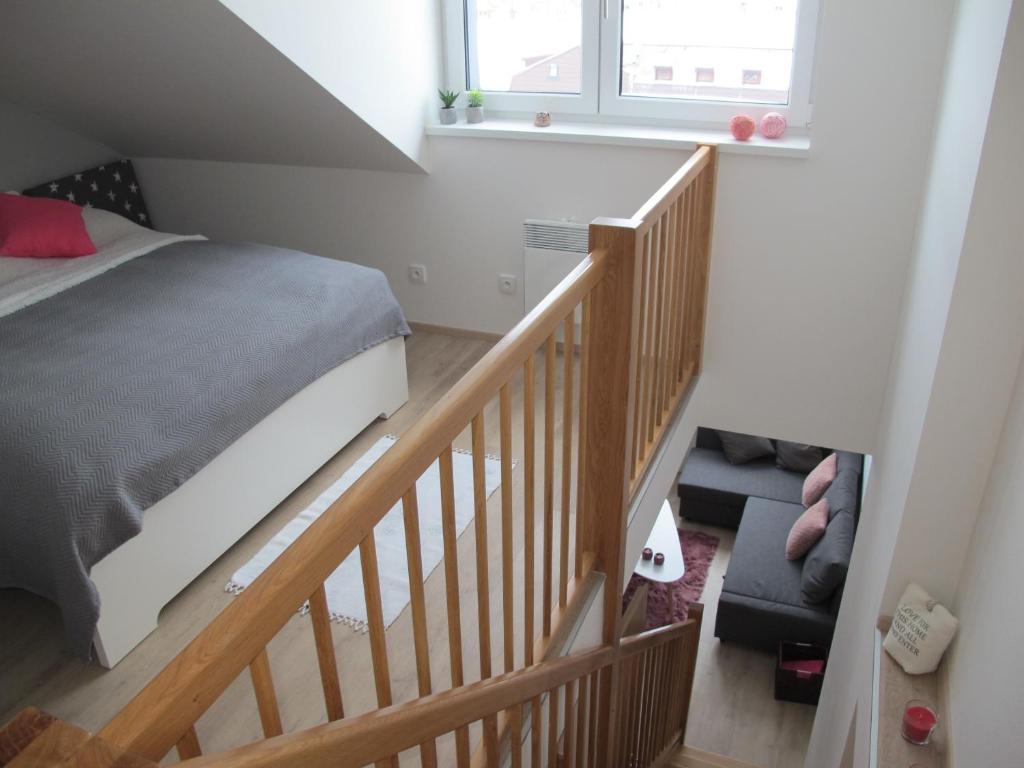 Postel nebo postele na pokoji v ubytování Dolní Morava - Apartmány