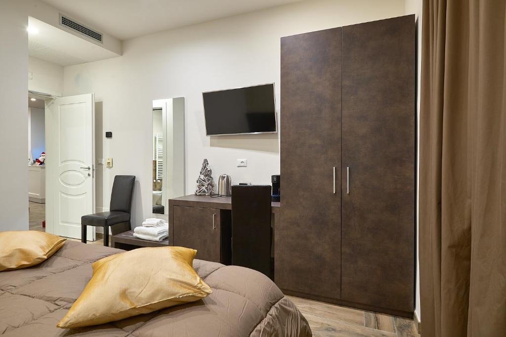 TV a/nebo společenská místnost v ubytování Ricaroka Hotel