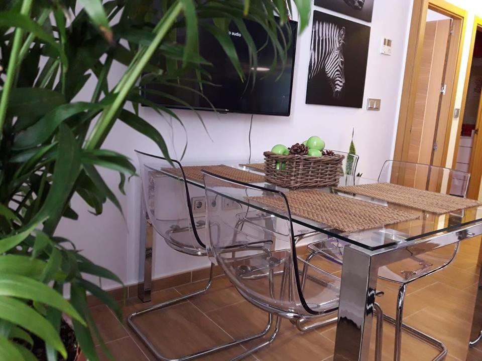 TV a/nebo společenská místnost v ubytování Periodista Luca de Tena, lujo y confort en pleno centro