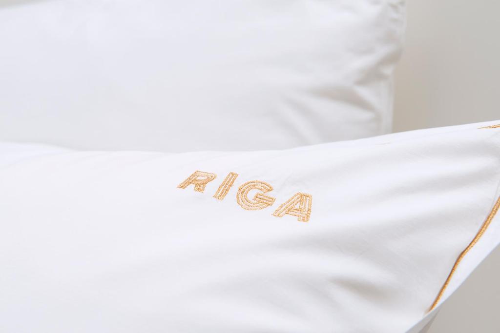 Postel nebo postele na pokoji v ubytování Hotel Riga