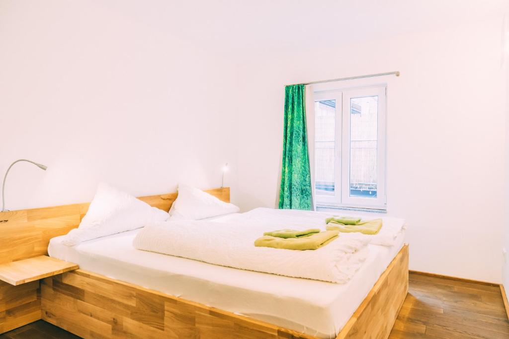 Postel nebo postele na pokoji v ubytování Stadthaus Gut Hügle