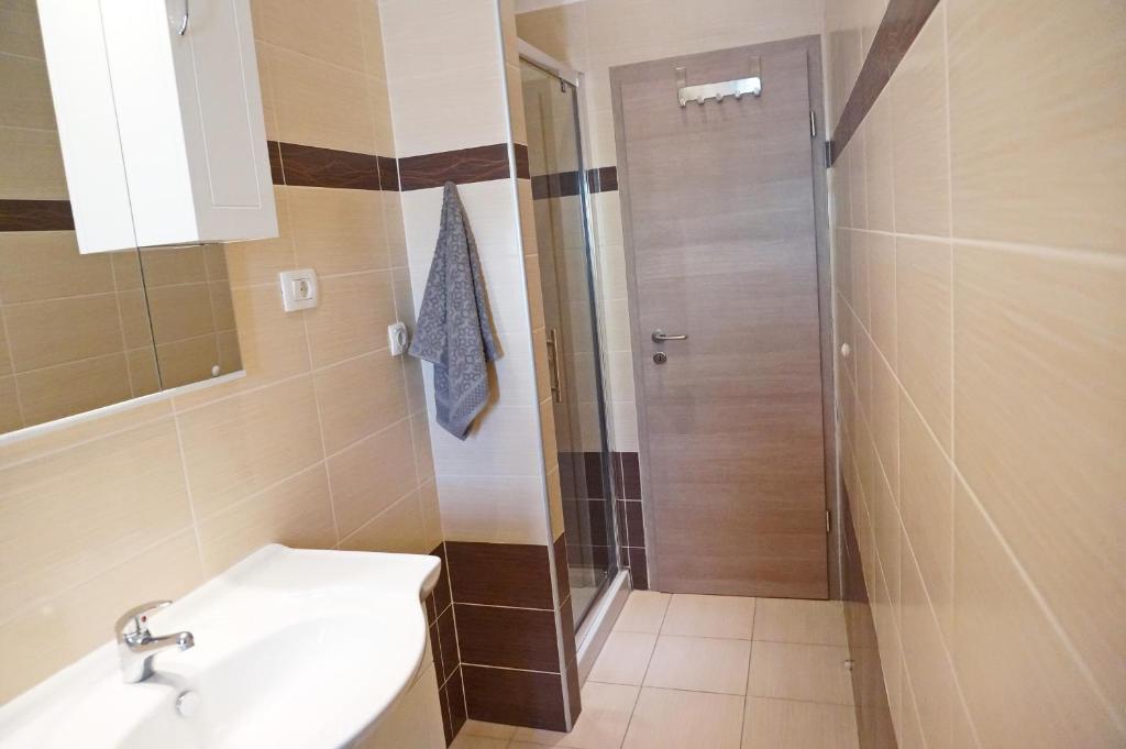 Łazienka w obiekcie Apartments Epulon