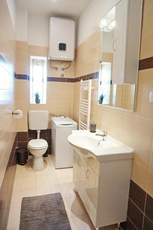 Łazienka w obiekcie Apartments Epulon