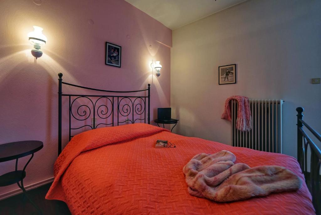 Posteľ alebo postele v izbe v ubytovaní To Balkoni tis Agorianis