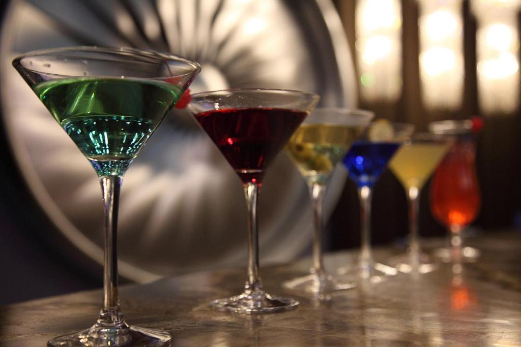 a group of wine glasses sitting on a table at Shanghai Hongqiao Airport Hotel - Air China in Shanghai
