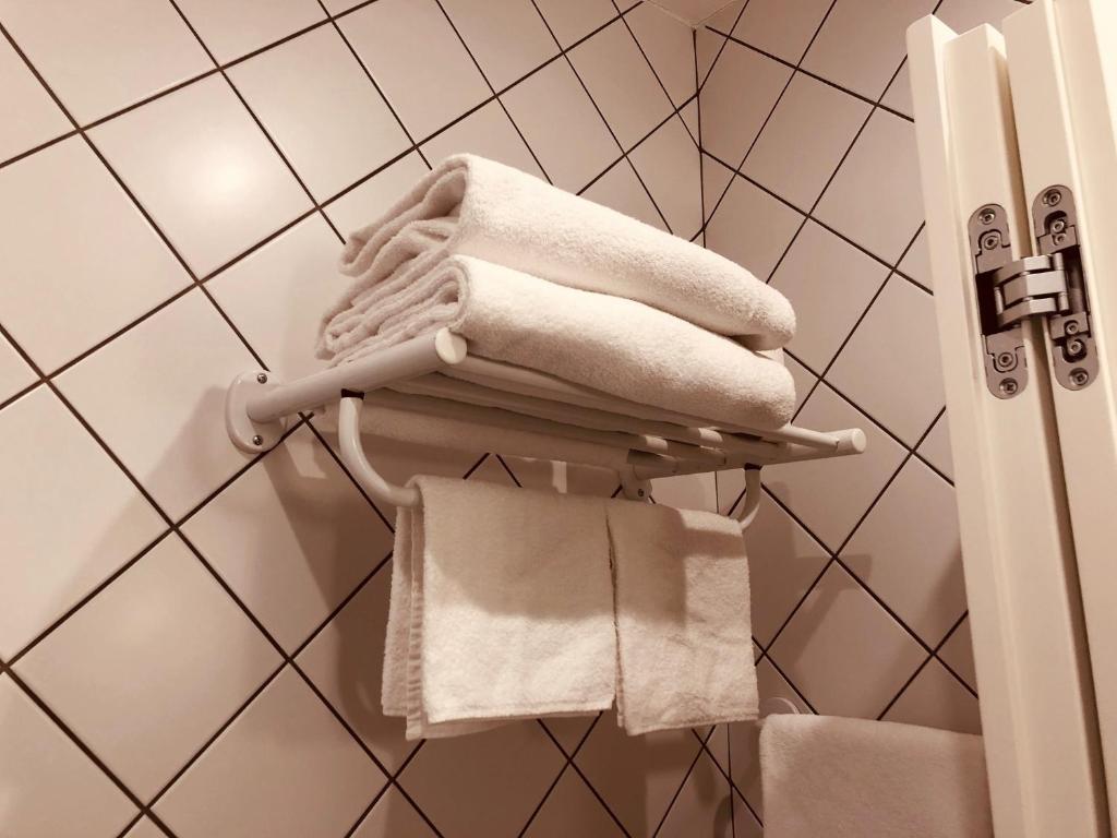 A bathroom at San Marco Design Suites