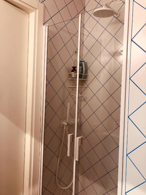 A bathroom at San Marco Design Suites
