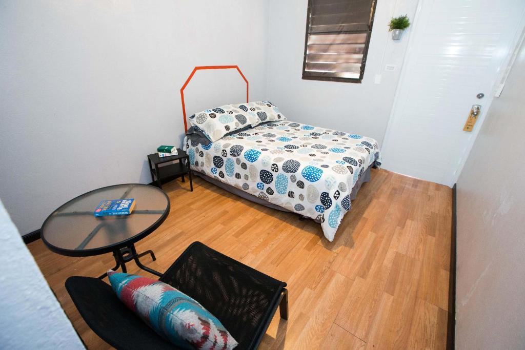 Postel nebo postele na pokoji v ubytování Casa Santurce