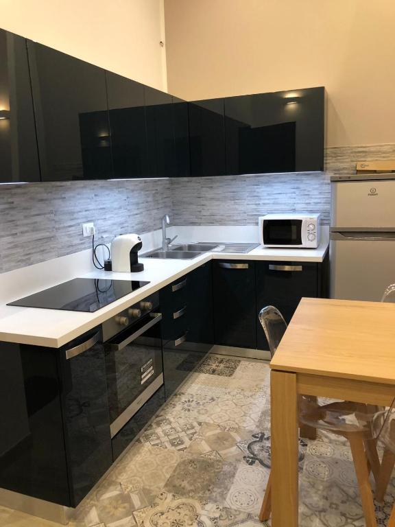 A kitchen or kitchenette at Kibilù - Viale Bligny - Porta Romana - Università Bocconi