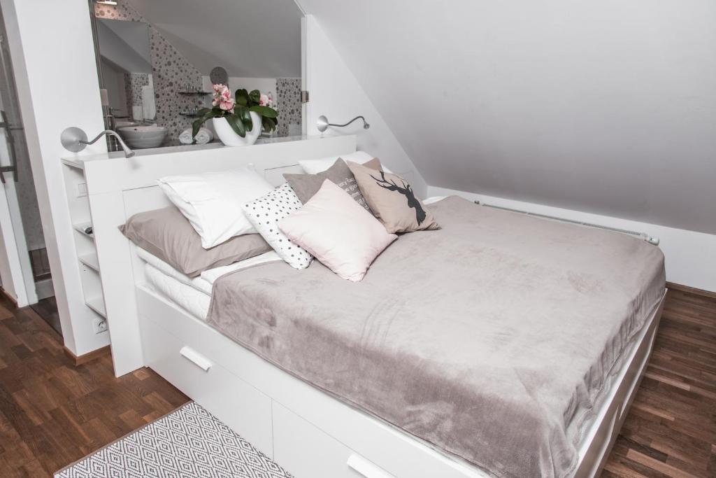 Postel nebo postele na pokoji v ubytování Apartment Vila Pavlovski