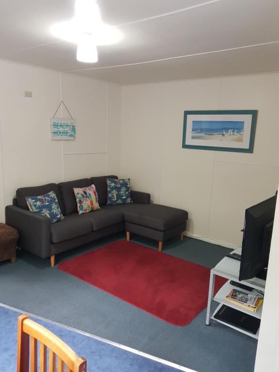 Area soggiorno di Phillip Island Cottages