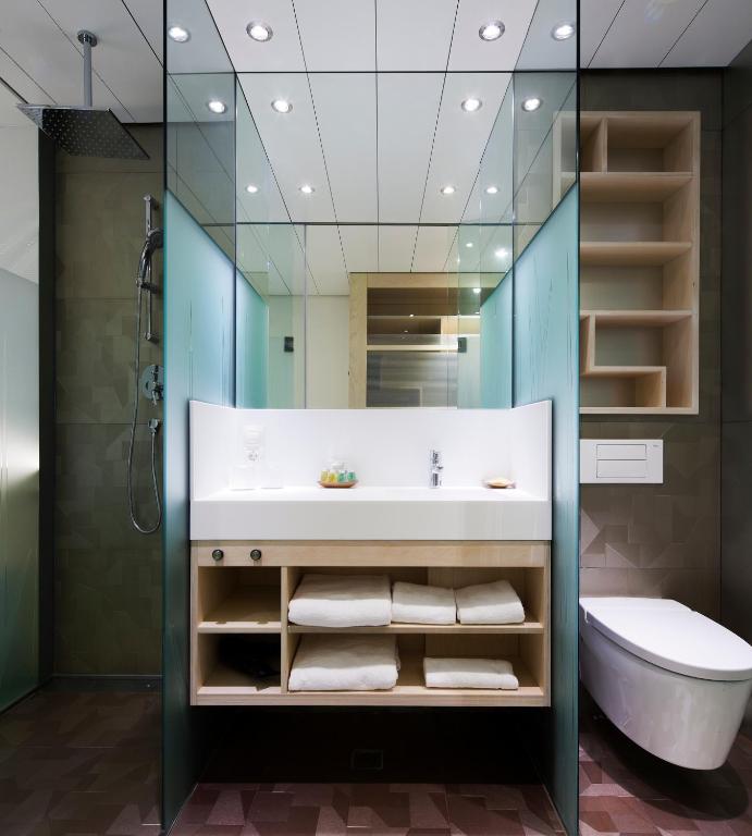 Un baño de Ako Suite Hotel