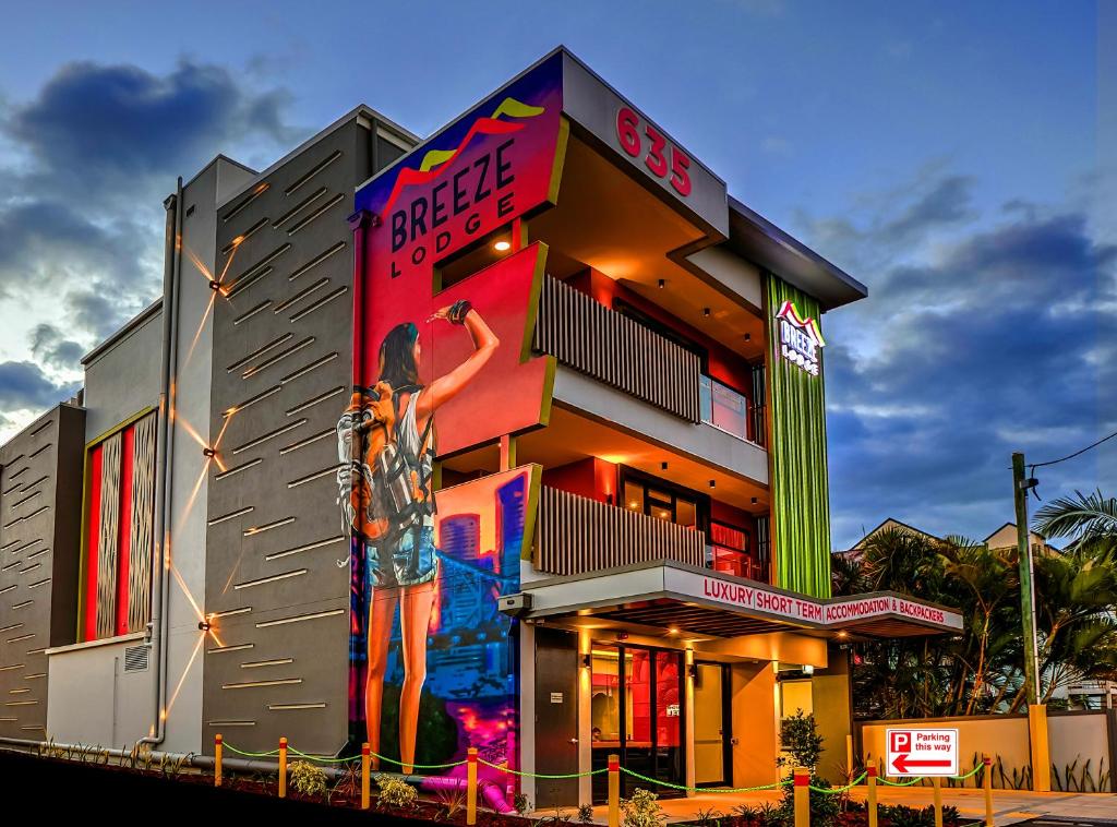 a building with a painting on the side of it at Breeze Lodge in Brisbane