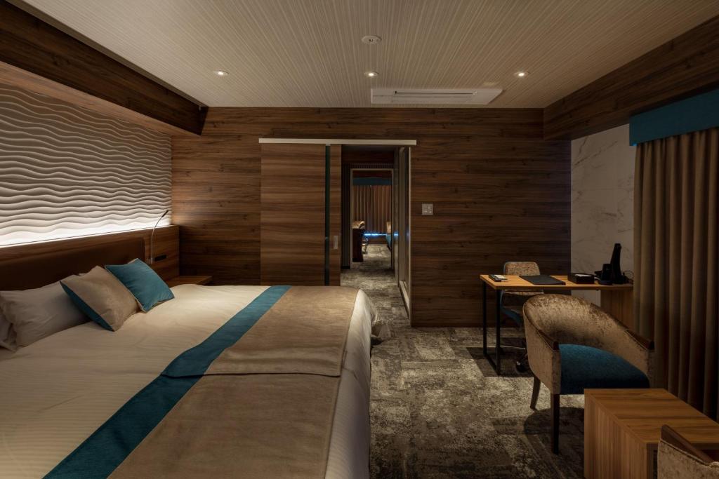 Postel nebo postele na pokoji v ubytování Wat Hotel & Spa Hida Takayama