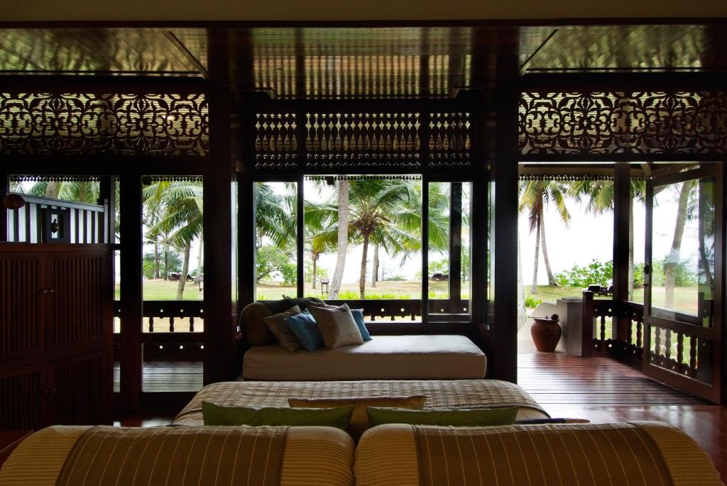 Postel nebo postele na pokoji v ubytování Tanjong Jara Resort, Terengganu - a Small Luxury Hotels of the World
