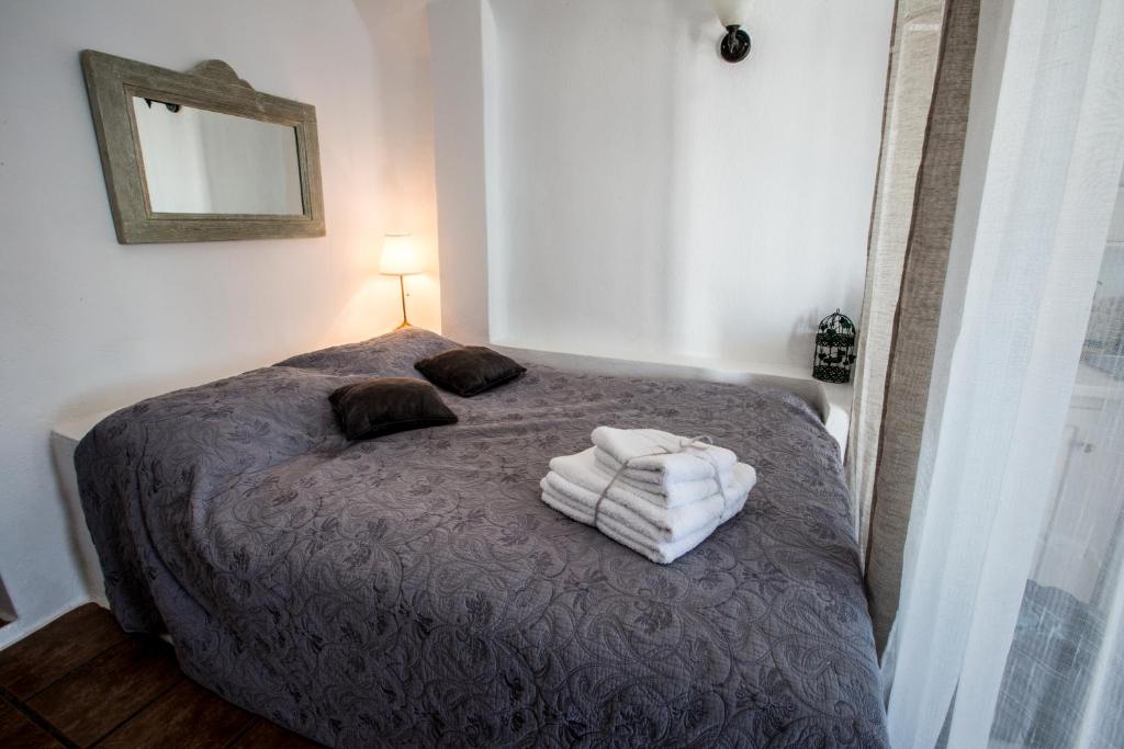 Postel nebo postele na pokoji v ubytování Afroessa Hotel by Pearl Hotel Collection