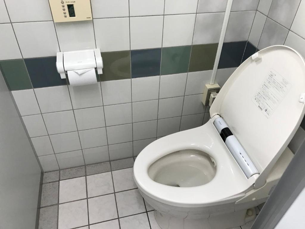 Koupelna v ubytování 海のお宿