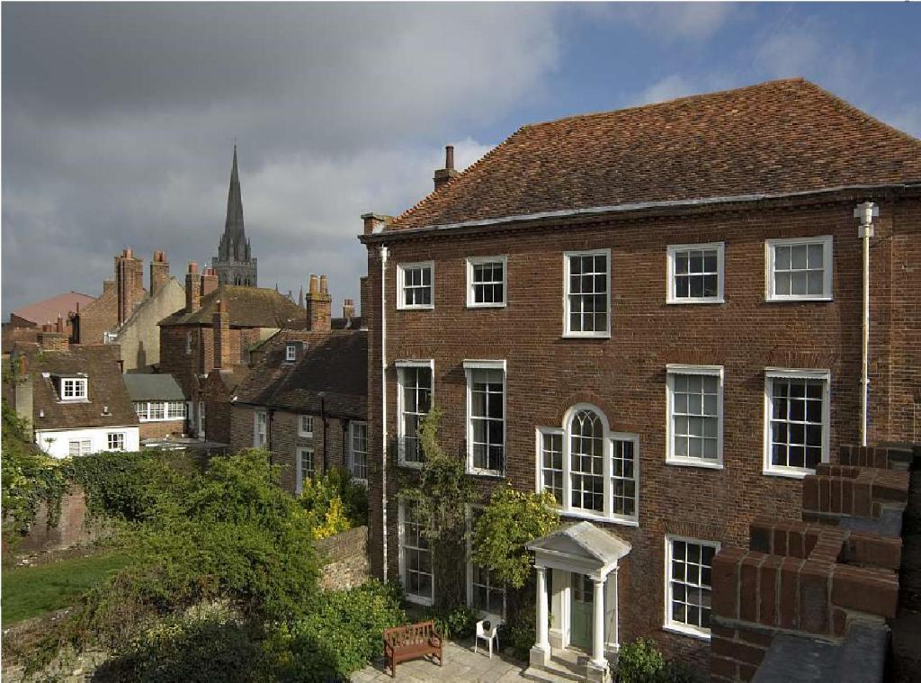 an old brick house in a city with a church at East Pallant Bed and Breakfast, Chichester in Chichester
