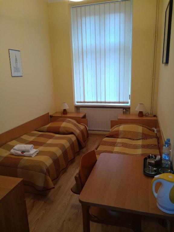 Posteľ alebo postele v izbe v ubytovaní CDR
