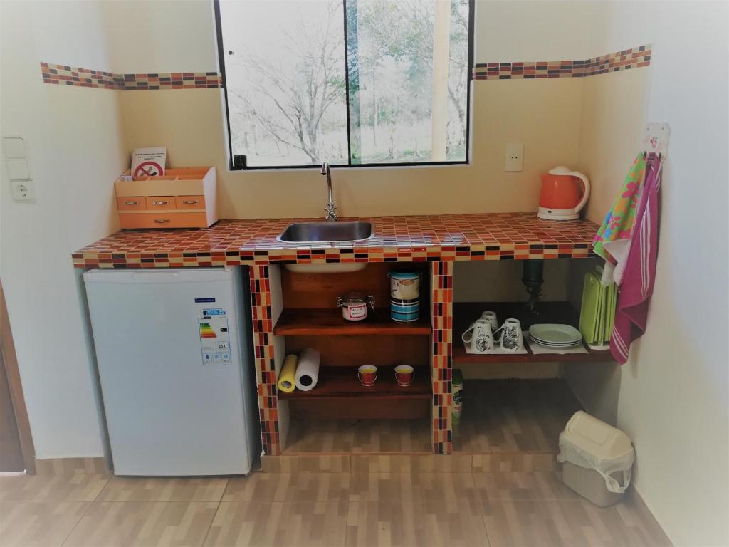 Kuchyň nebo kuchyňský kout v ubytování Posada Bavaria