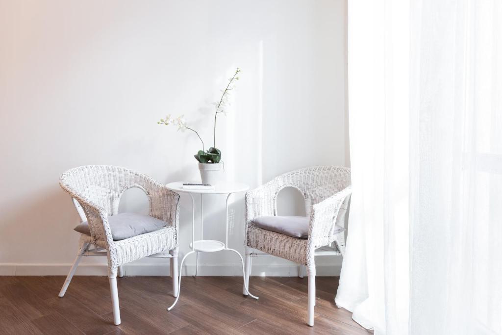 A seating area at Quattro Canti Charming Flat