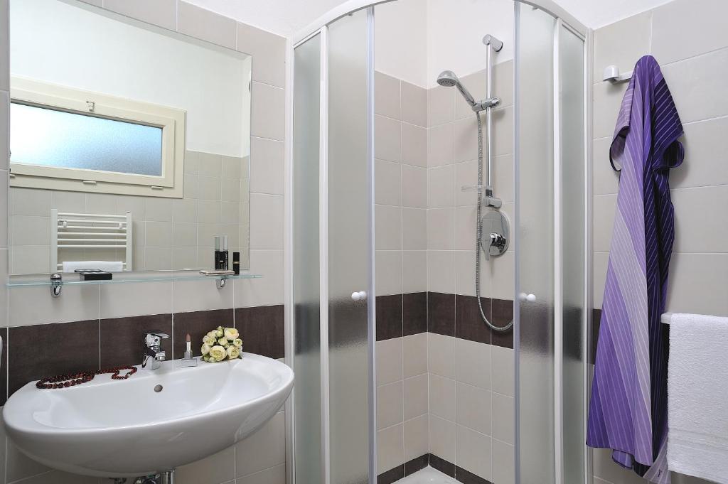 Koupelna v ubytování Hotel Favorita