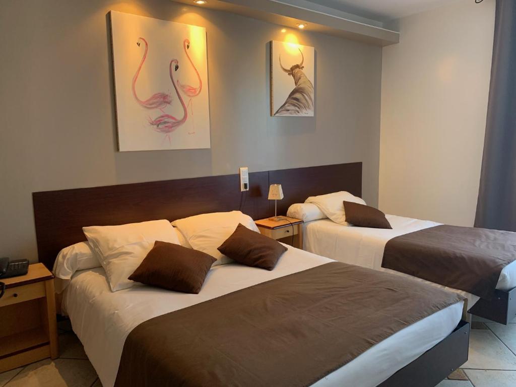 Postel nebo postele na pokoji v ubytování Hôtel restaurant Mon Auberge