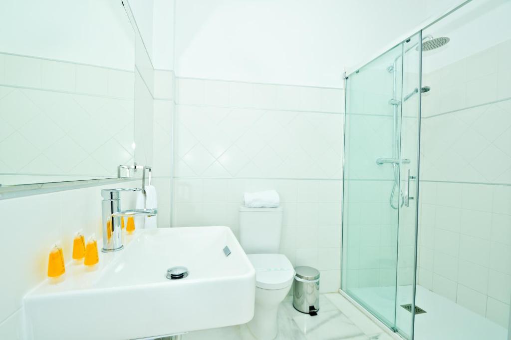 Kúpeľňa v ubytovaní NineSuites