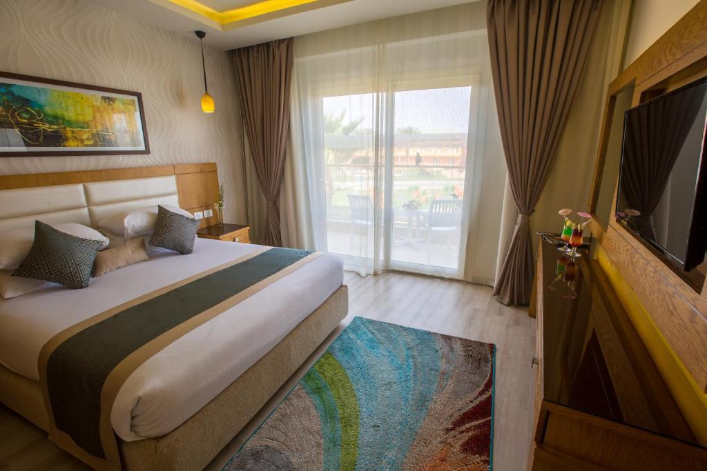 Letto o letti in una camera di Pickalbatros Aqua Blu Sharm El Sheikh