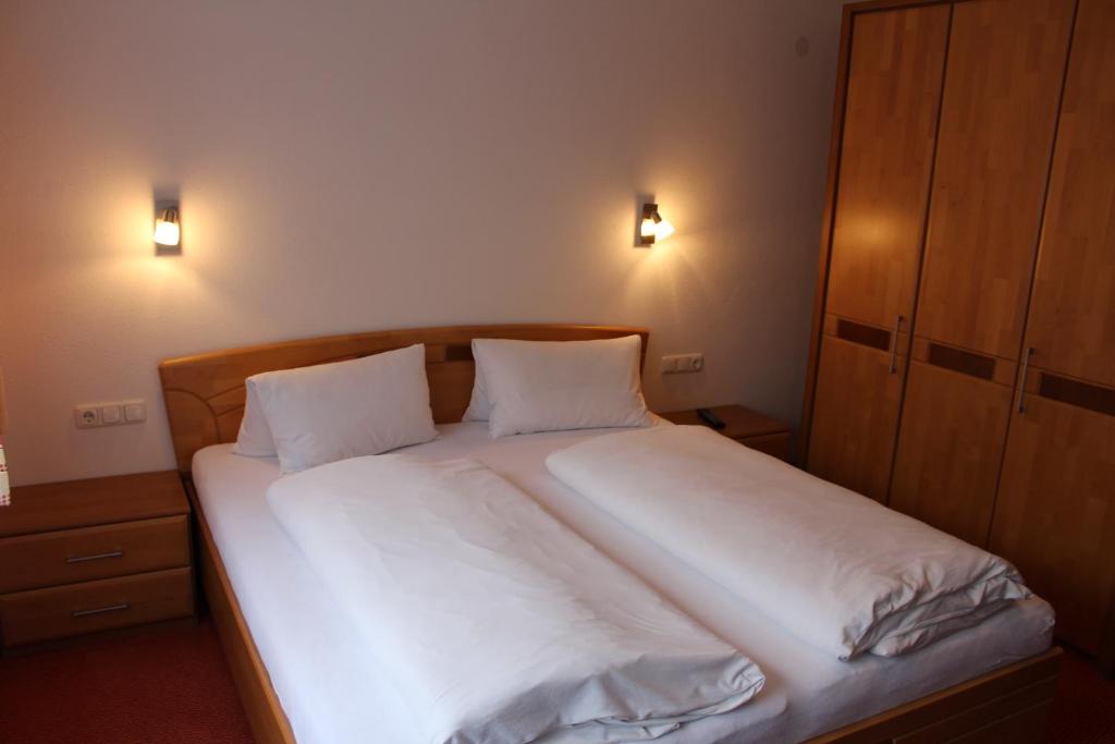 Postel nebo postele na pokoji v ubytování Haus Birgit