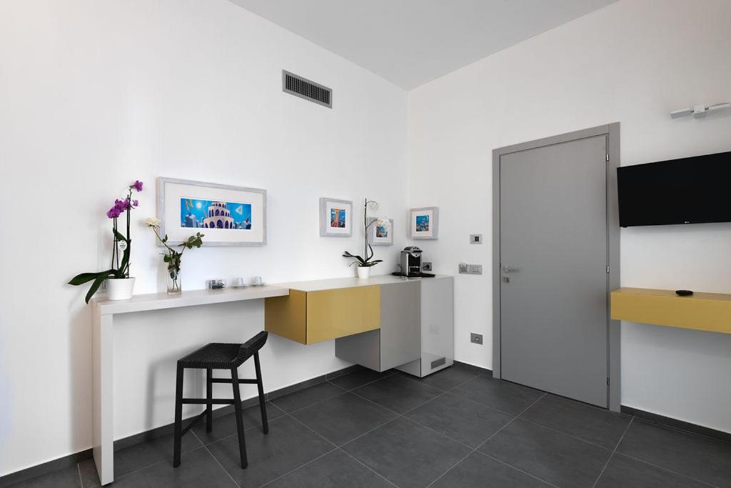 TV a/nebo společenská místnost v ubytování nautilus b&b suite design