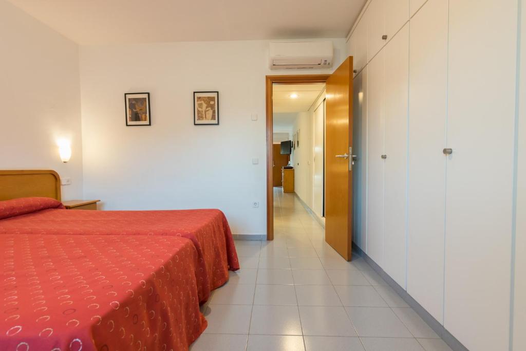 Postel nebo postele na pokoji v ubytování Hotel Lodomar Spa & Talasoterapia