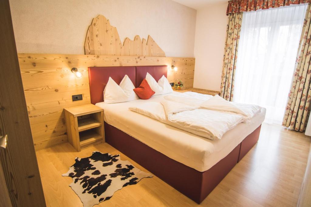 Posteľ alebo postele v izbe v ubytovaní Residence Sisi