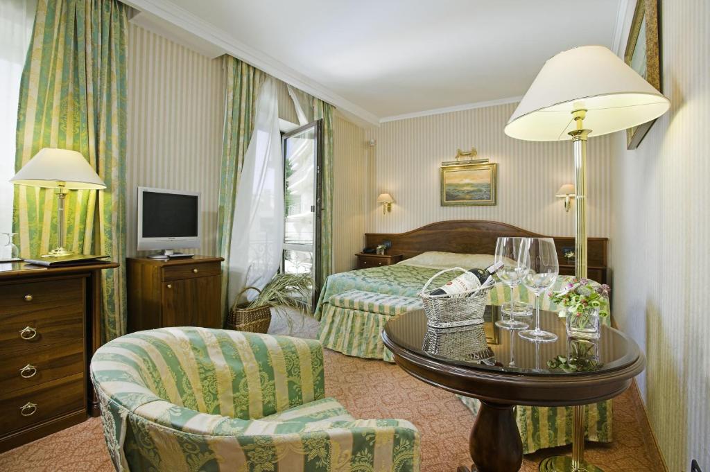Postel nebo postele na pokoji v ubytování Hotel Otrada