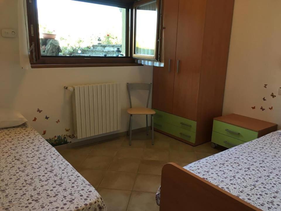 Postel nebo postele na pokoji v ubytování Agriturismo Al Franet