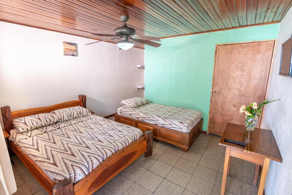 Postel nebo postele na pokoji v ubytování Cabinas Arrecife