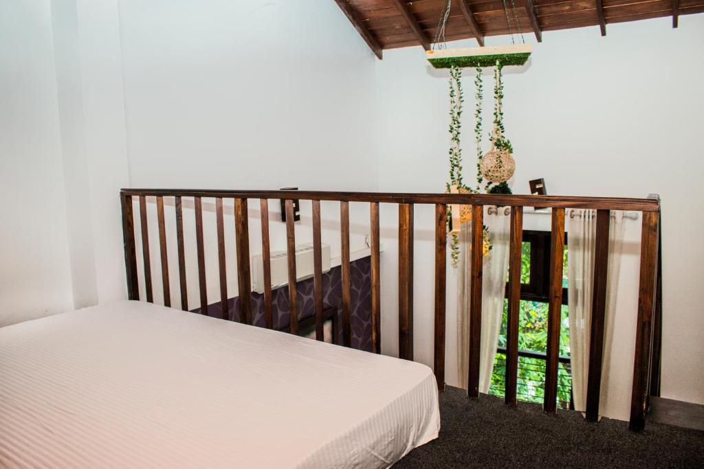 Postel nebo postele na pokoji v ubytování Hotel Bella Vista