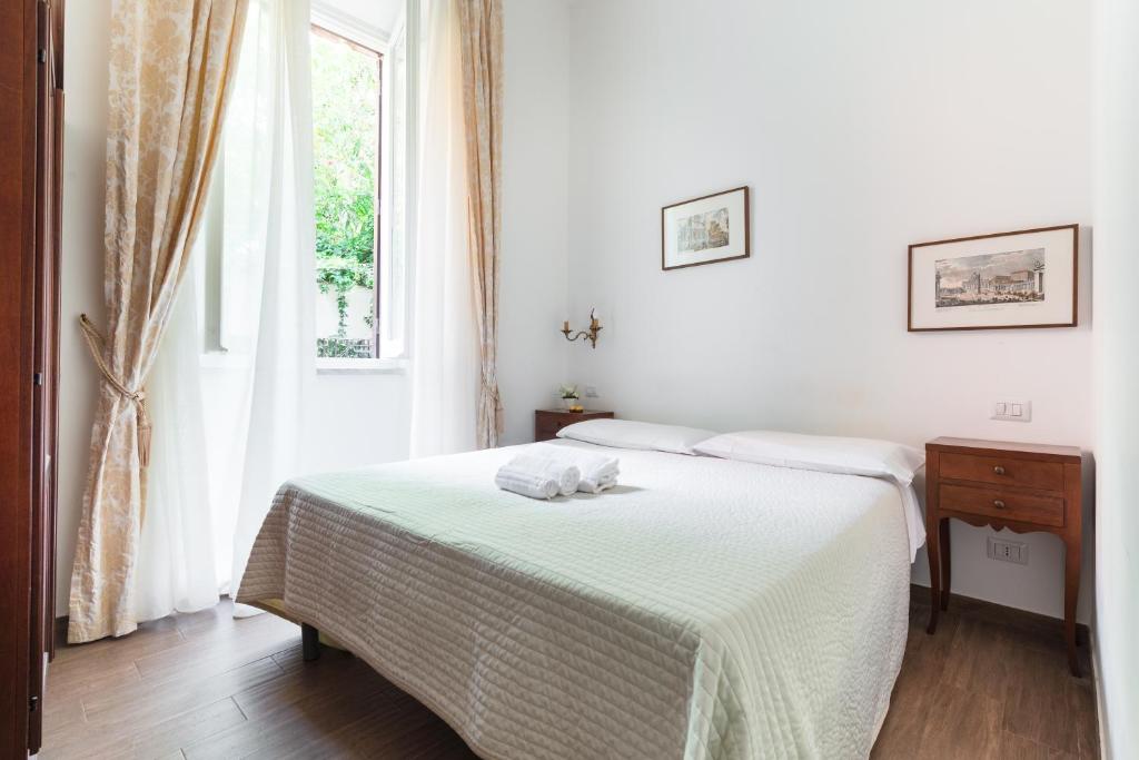 Postel nebo postele na pokoji v ubytování Casa in Monti