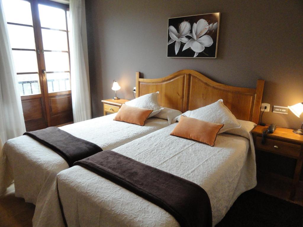 Cama o camas de una habitación en Hotel Restaurante Casa Petronila