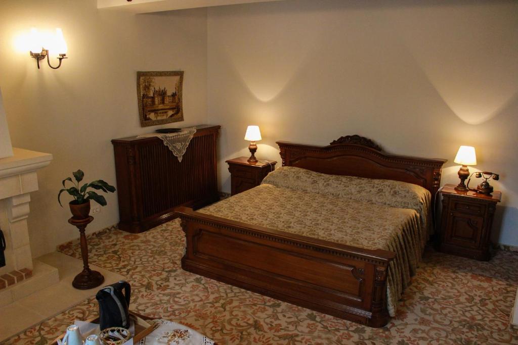Postel nebo postele na pokoji v ubytování Hotel Medieval