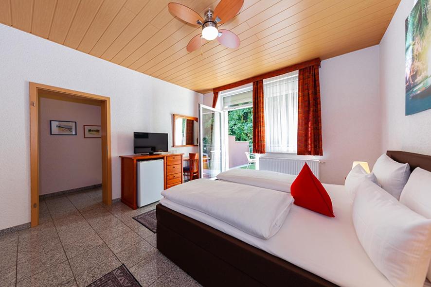 Postel nebo postele na pokoji v ubytování Hotel Avalon