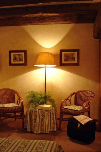 Posezení v ubytování Hotel L'Ultimo Mulino