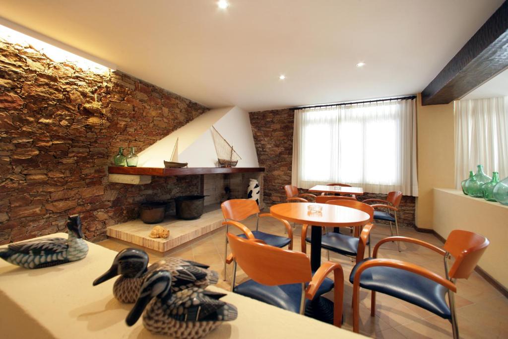 Posezení v ubytování Hotel Sa Riera