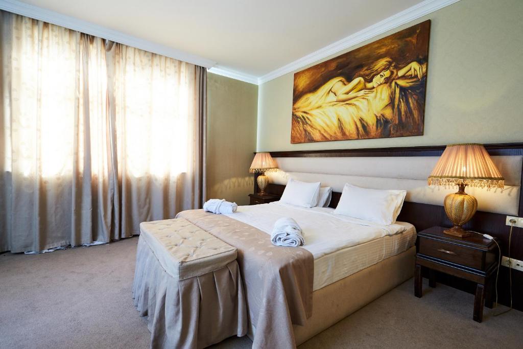 Postel nebo postele na pokoji v ubytování Smith Hotel