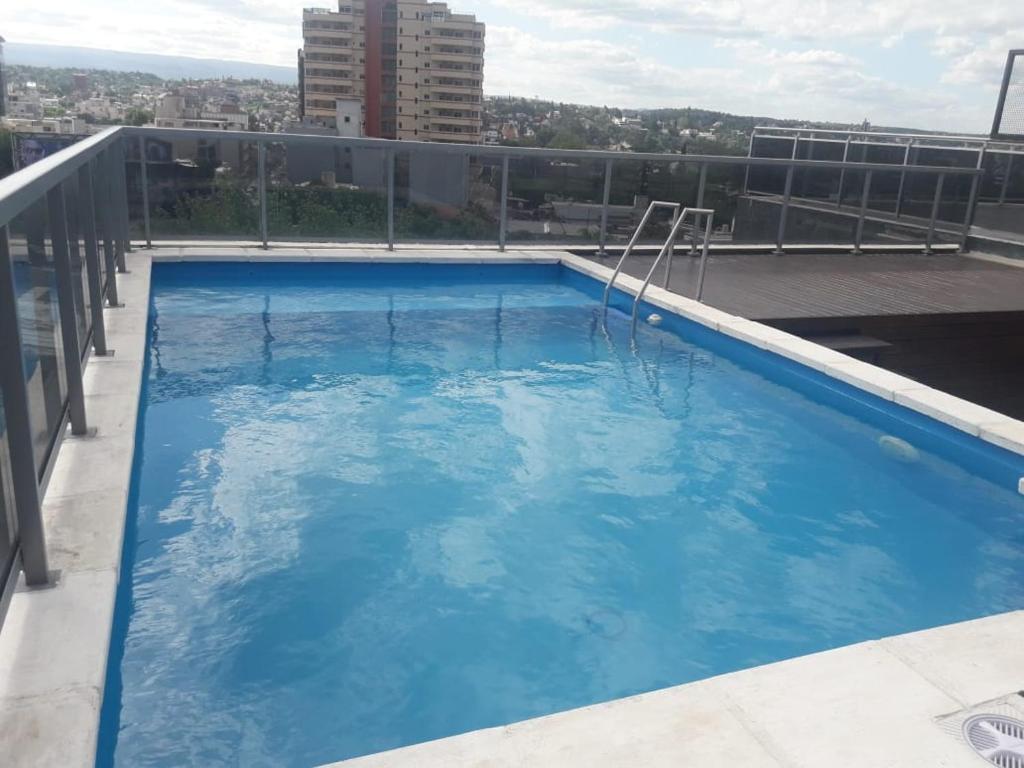 Πισίνα στο ή κοντά στο Departamento Luxor