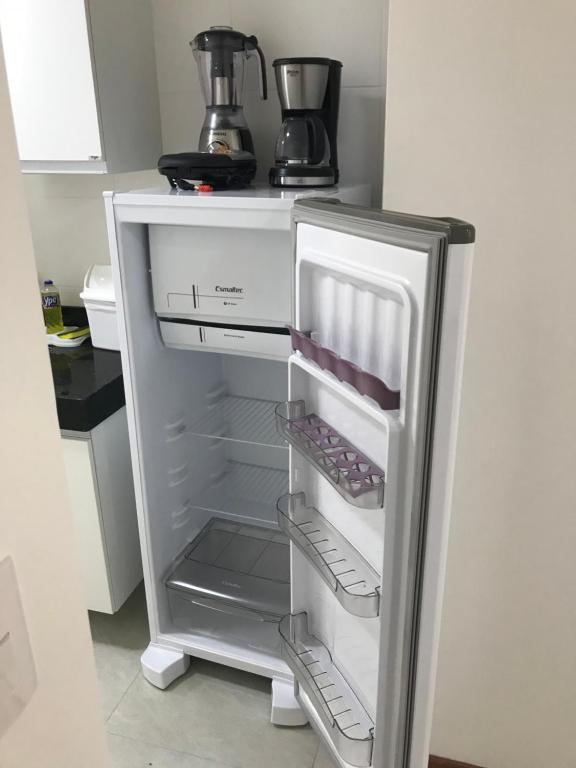 Kuchyň nebo kuchyňský kout v ubytování Apartamento Completo Jatiúca